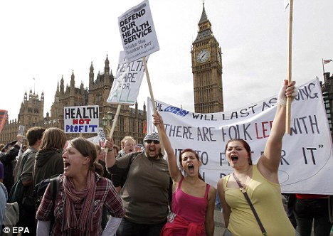 More to come: Protesters flocked to Westminster Bridge where they demonstrated against cuts to the National Health Service in Britain